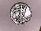 U S 1942 Walking Liberty 1/2 Dollar FINE