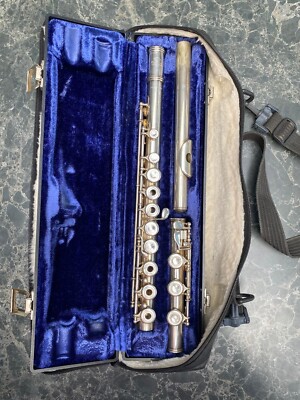 Emerson solid silver flute, part open holed, extended foot, double thumb plate.