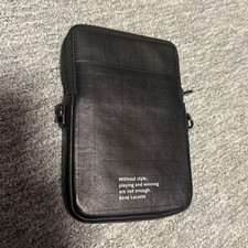Lacoste Herren Umhängetasche Leder schwarz k...