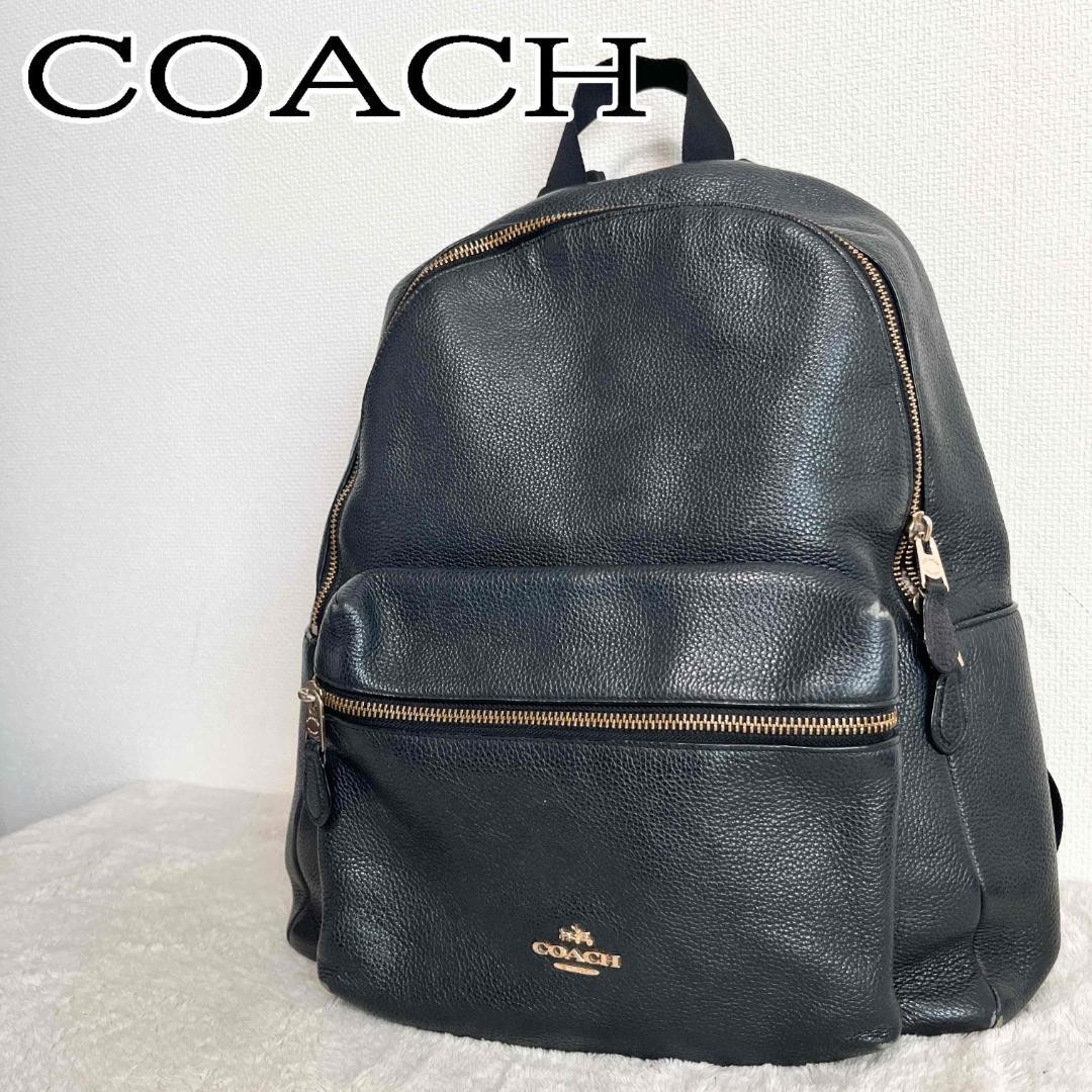 COACH navy leather backpack in excellent pre-owned condition  