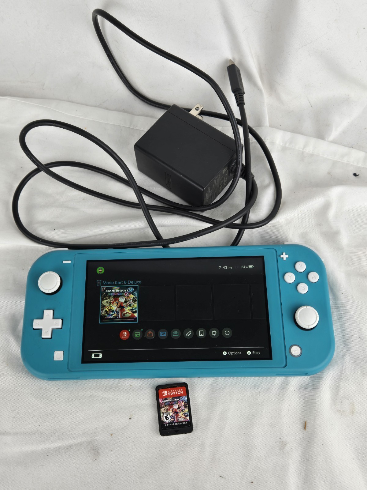 Nintendo Switch Lite Handheld Console - Turquoise With Mario Kart 8 Deluxe