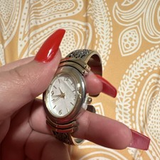 Women's Silver Metal Analog Wristwatch White Dial Oval Bangle Arabic Numerals