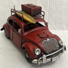 Tin Red Beetle Car with Surfboard And Luggage...