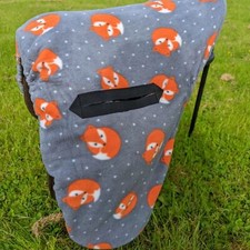 Szary pokrowiec na siodełko z nadrukiem lisa Ride On Fleece z regulowanym przełącznikiem