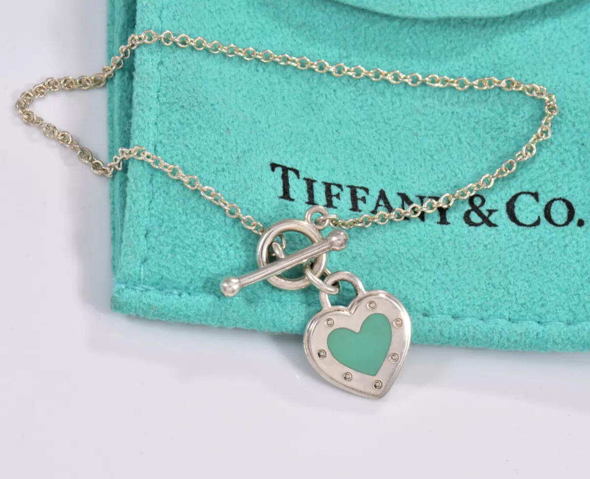 Tiffany bracelet with blue heart deals charm