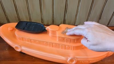 Vintage Marx Orange Plastic Tug Boat Rolling Pull Toy Whistles w