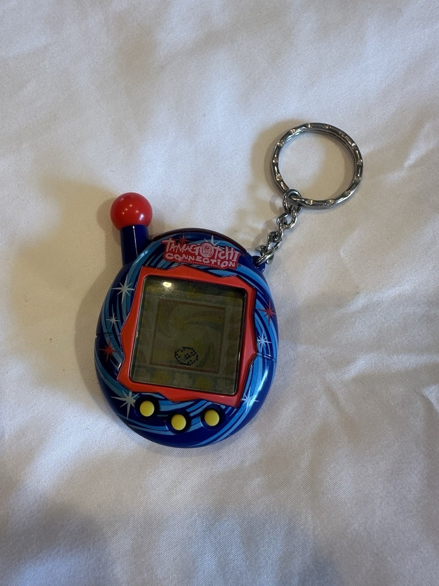Tamagotchi Connection Blue & Red Galaxy Stars Swirl V4 2004