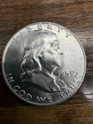 1959 Uncirculated Franklin Half Dollar Actual Coin. Better grade Coin