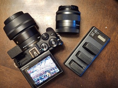 Canon EOS M6 Mark II, Sigma 30mm f1.4, 15-45mm EFM lens, SD Card,  3 Batteries