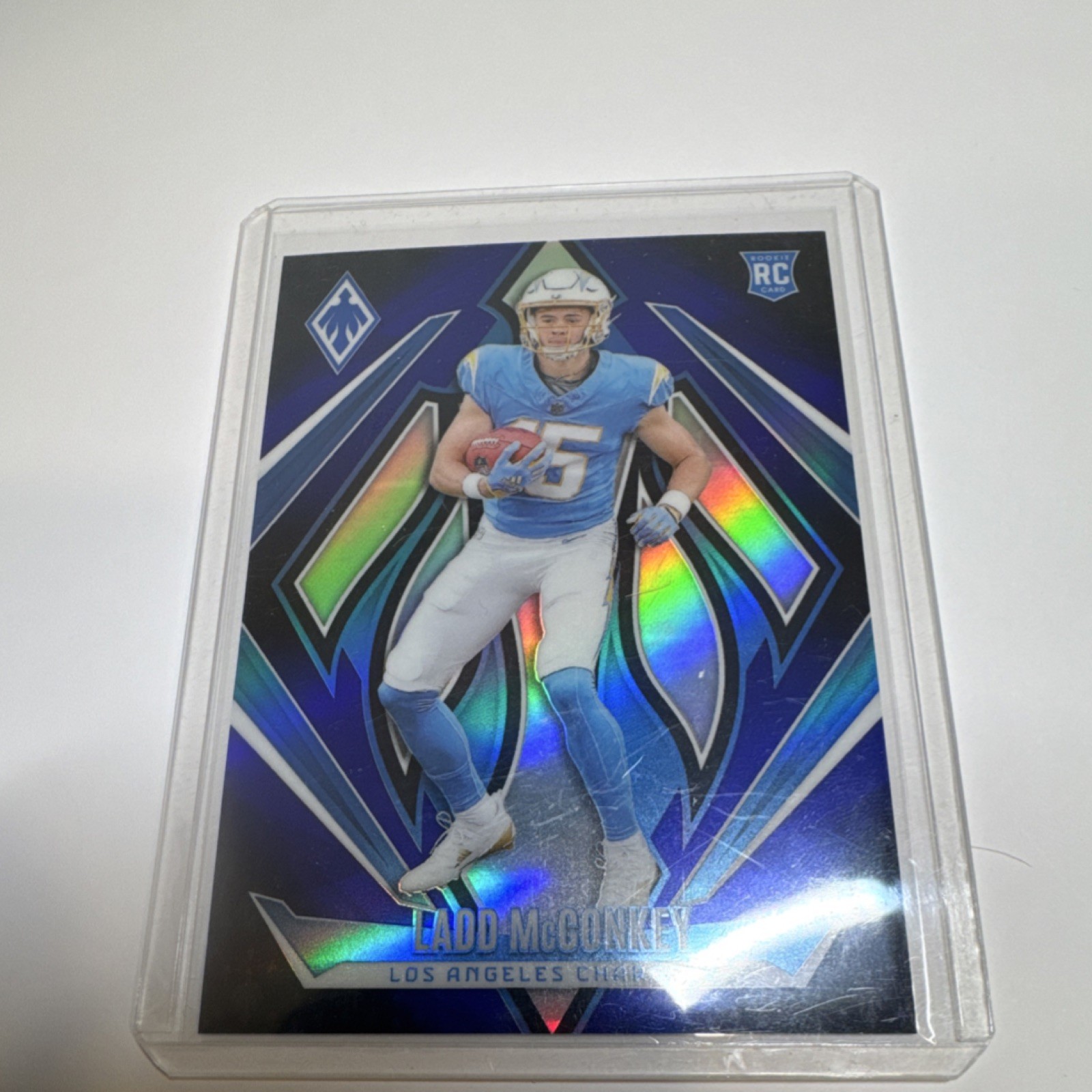 2024 Panini Phoenix Rookies Ladd McConkey #216 Blue Fade /249 RC