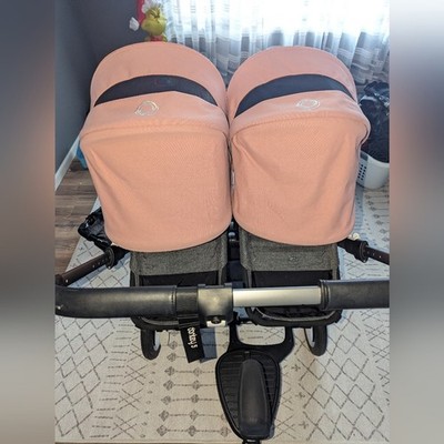 Bugaboo Donkey 5 Double Stroller with Pink Canopys.