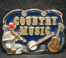 XD07167 VINTAGE 1987 COUNTRY MUSIC GENRE INSTRUMENTS MENS BELT BUCKLE
