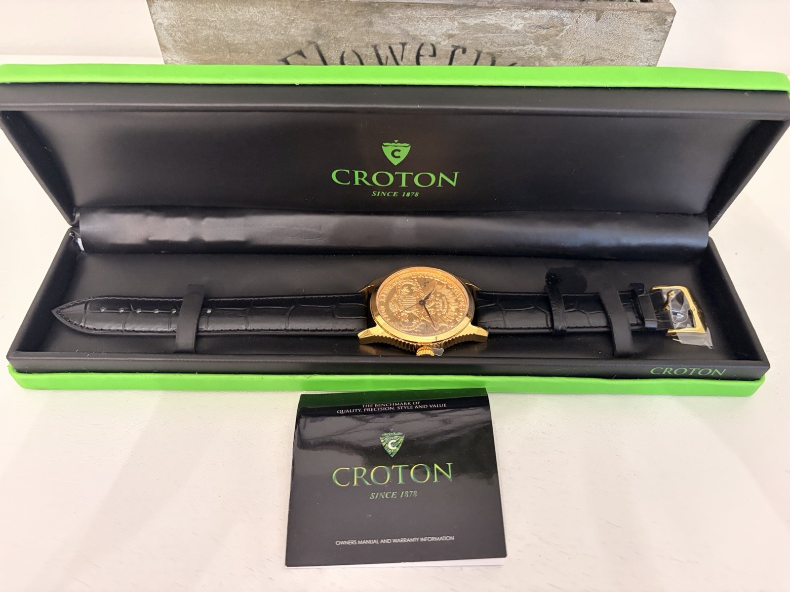 Croton Men's Quartz Gold Dial Gold Tone SS Case Black Leather Strap Box