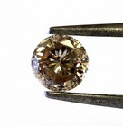 GIA certified loose round .83ct I1 natural fancy orange brown diamond champagne — photo 1