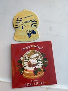 Texas Lottery holiday-themed scratch-off ticket and a corresponding gift tag