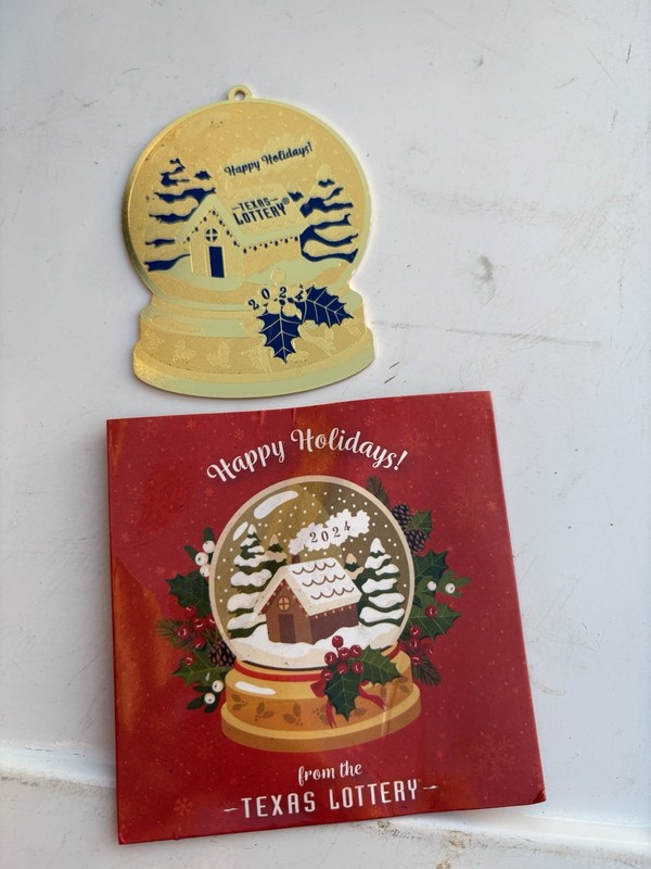 Texas Lottery holiday-themed scratch-off ticket and a corresponding gift tag