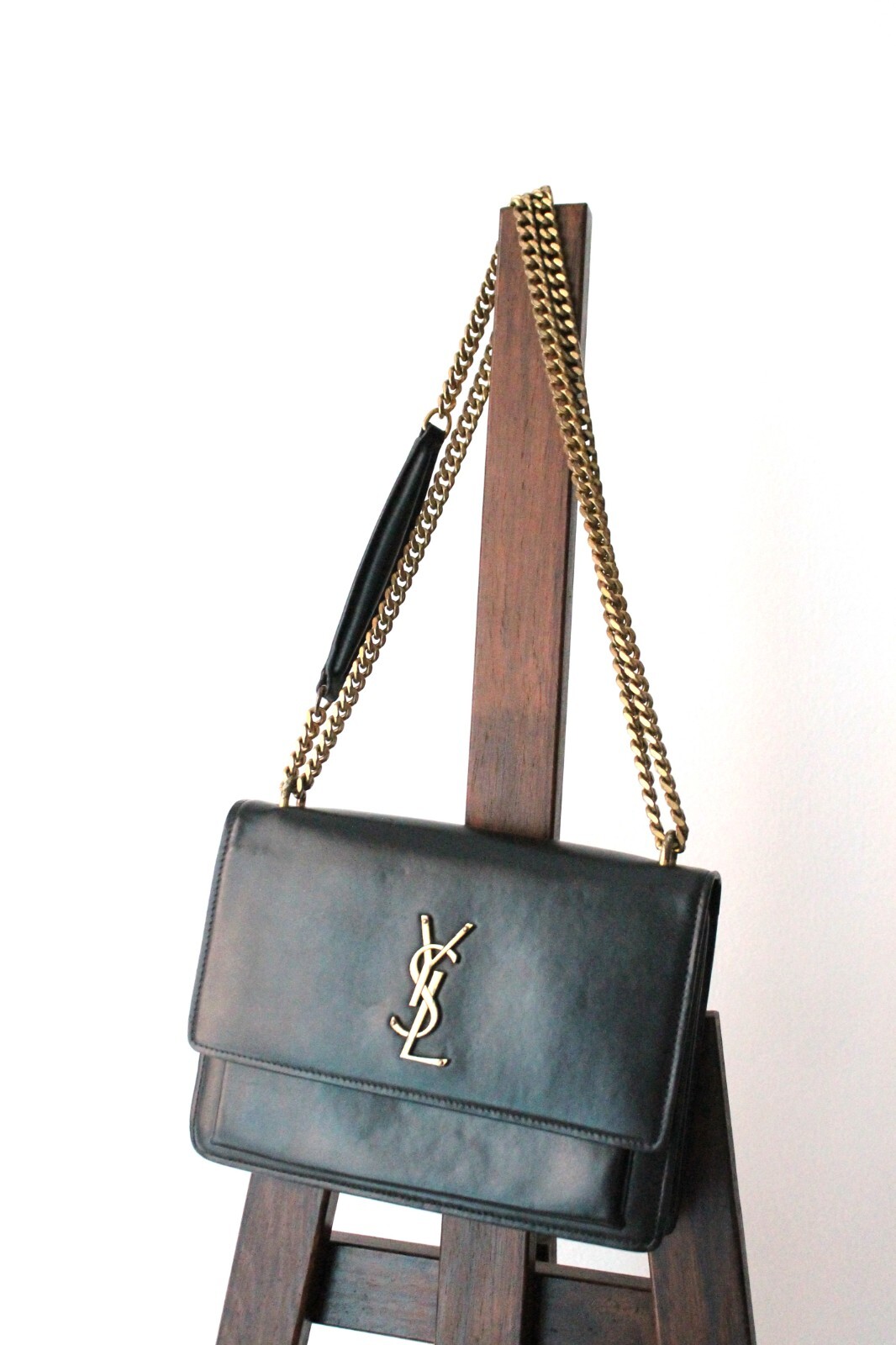 Yves Saint Laurent sac à main modèle Sunset en cuir noir