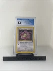 TEAM ROCKET’S MEOWTH Pokemon Card 2000 Black Star Promo - #18 - CGC 8.5