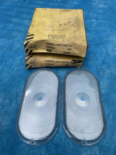 Pontiac 1957 luces de estacionamiento lentes nuevo par - Imagen 1 de 12