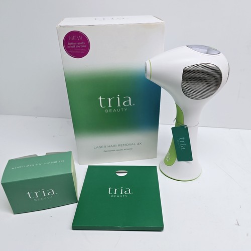 New Open Box Tria Beauty Hair Removal Laser 4X Green Complete Charger Manuals