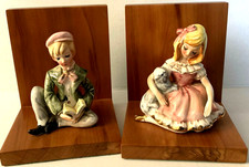 Bookends With Porcelain Boy And Girl Figurines