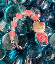hello kitty iridescent mermaid charm strap