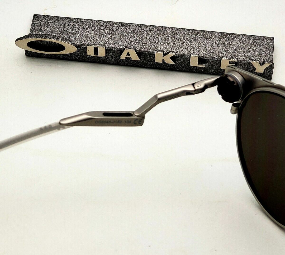 New Oakley Deadbolt Sunglasses OO6046-0150 Satin Chrome New Oakley Deadbolt Sunglasses OO6046-0150 Satin Chrome