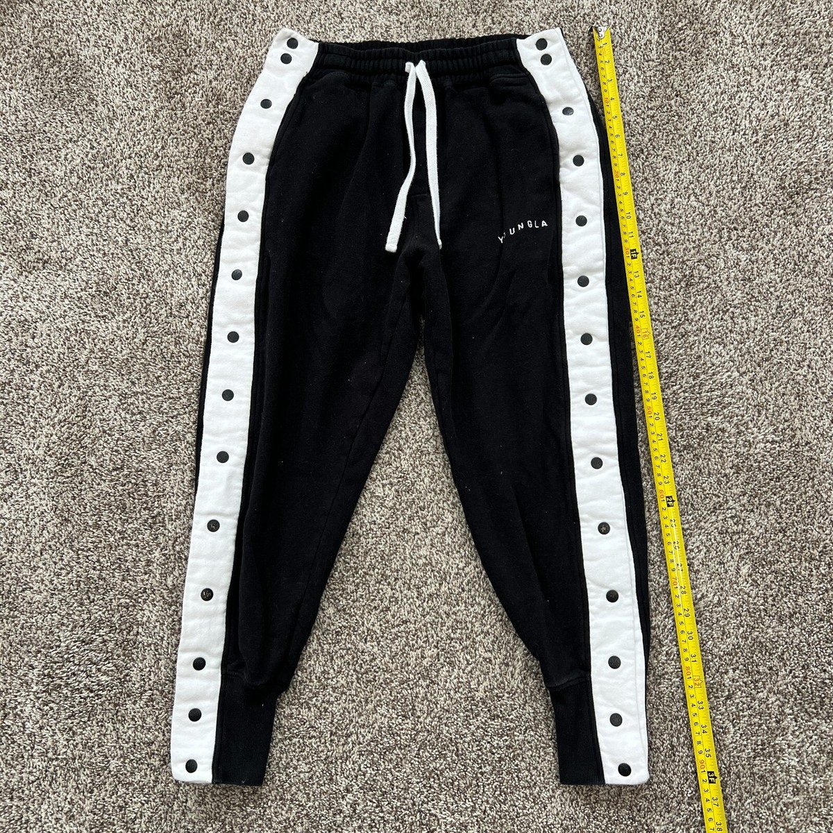 snap button track pants mens