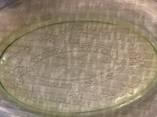 Green Depression glass platter. It is also known as uranium glass.