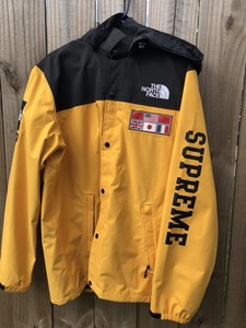 supreme north face jacket yellow