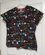 SCRUBSTAR SCRUB TOP W/2 POCKET. BLACK W/MULTICOLORED CHRISTMAS DESIGN. SIZE: 2XL