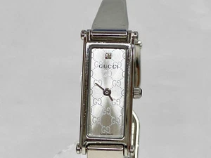 Montre GUCCI 1500L acier inoxydable cadran argenté 1P diamant quartz d'occasion pour femme