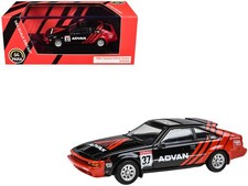 Paragon PA-55445 1/64 1984 Toyota Celica Supra #37 "ADVAN" Black and