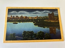 Lights of Downtown District Across Lake Merritt Oakland California Postcard