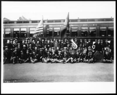 veterans Teddys Terrors in front of a Santa Fe train with their ba - Old Photo