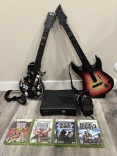 Xbox 360 S Console 250 GB + Guitar Hero + Roc...