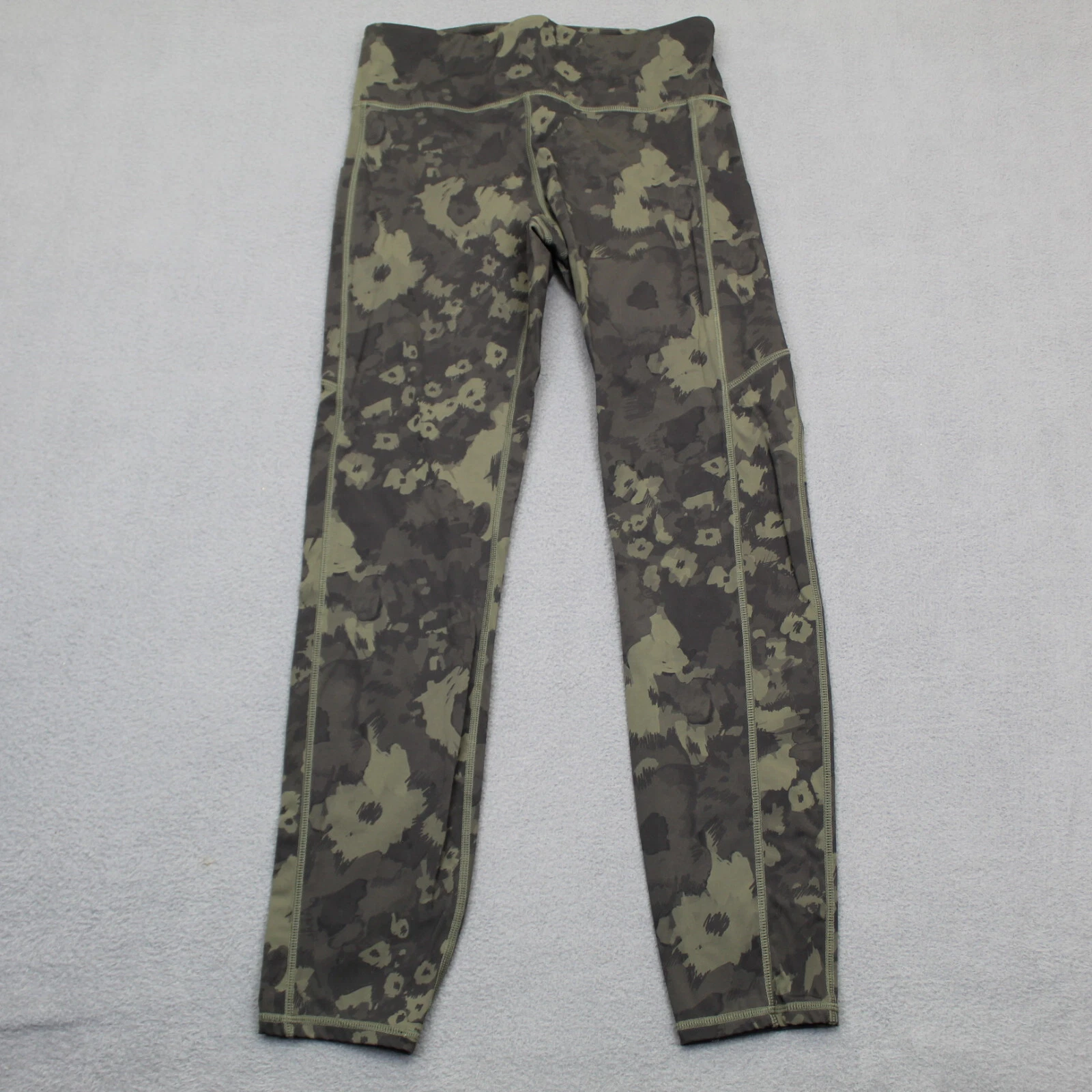 vuori stride performance zip pocket camouflage yoga leggings