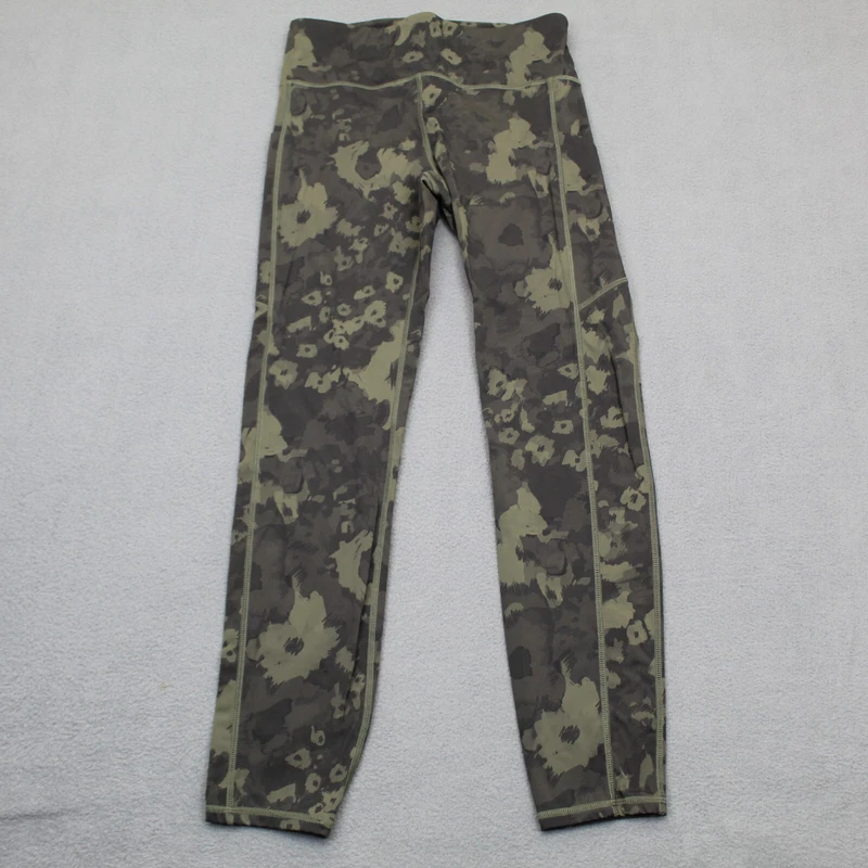 vuori stride performance zip pocket camouflage yoga leggings
