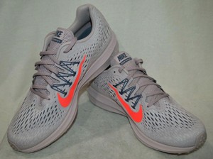 nike zoom winflo 5 particle rose