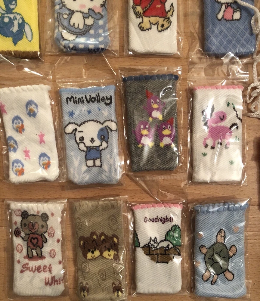 Handytaschen aus Thailand für Sammler, bunt, verschiedene Motive