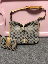 Woman's Coach Signature Handbag with Matching Wallet