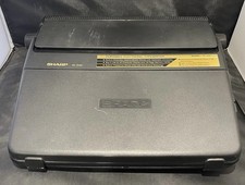 Sharp PA-3140 Electronic Typewriter Portable With Hard Cover & Spare Ribbons