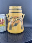 Roseville Pottery Vase 671-7” Yellow Laurel W/Hairline See Photos.