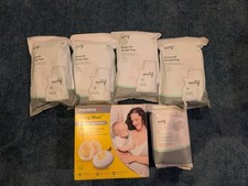 Medela Swing Maxi Pump  1 Bag Nursing Pads  4 Breastmilk Storage Bags