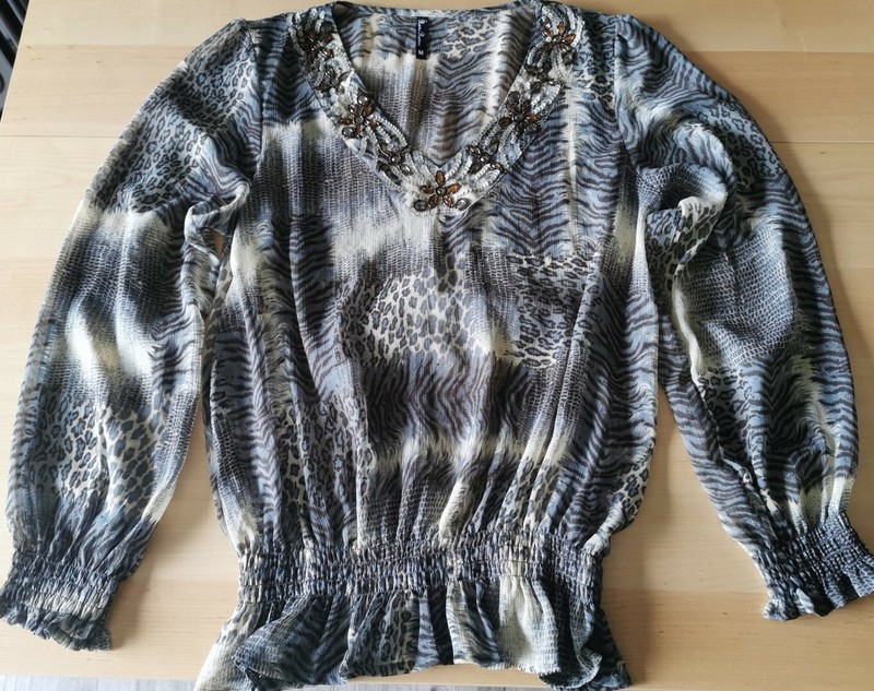 Rena Renee animal print top