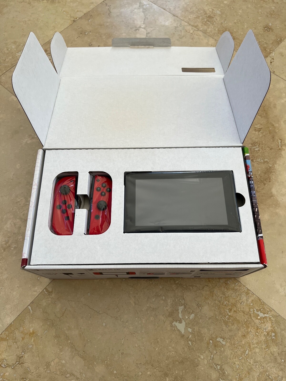 Nintendo Switch Super Mario Odyssey Edition (with Red JoyCons) 32GB