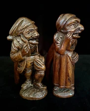 Awesome! Pair MAN & LADY CARVED NUTCRACKERS Swiss Black Forest c 1890- RIGI MARK
