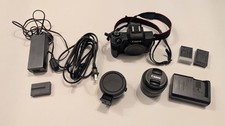 Canon EOS M50 Mirrorless Camera with lens, 2 batteries and EF lens adapter