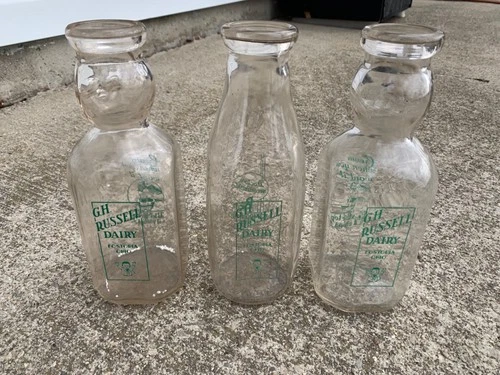 3 Vintage G.H. Russell Fostoria, OH. Glass One Quart Milk Bottles Advertising.