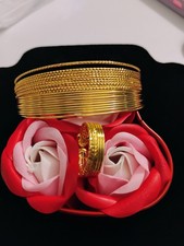 Gold-Tone Floral Bangle Set with Intricate Detailing